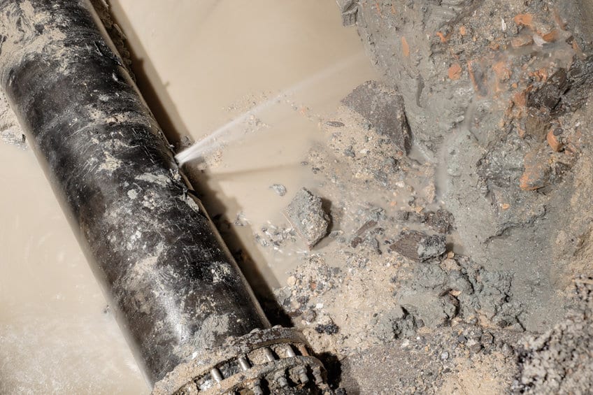 A pipe leak in a crawlspace