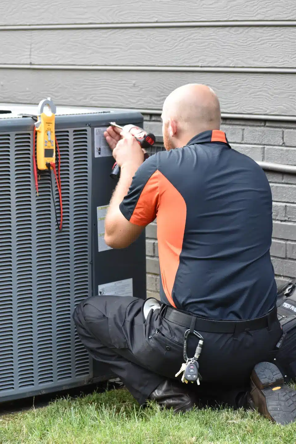 HVAC technician performing AC repair in Harrisburg, NC