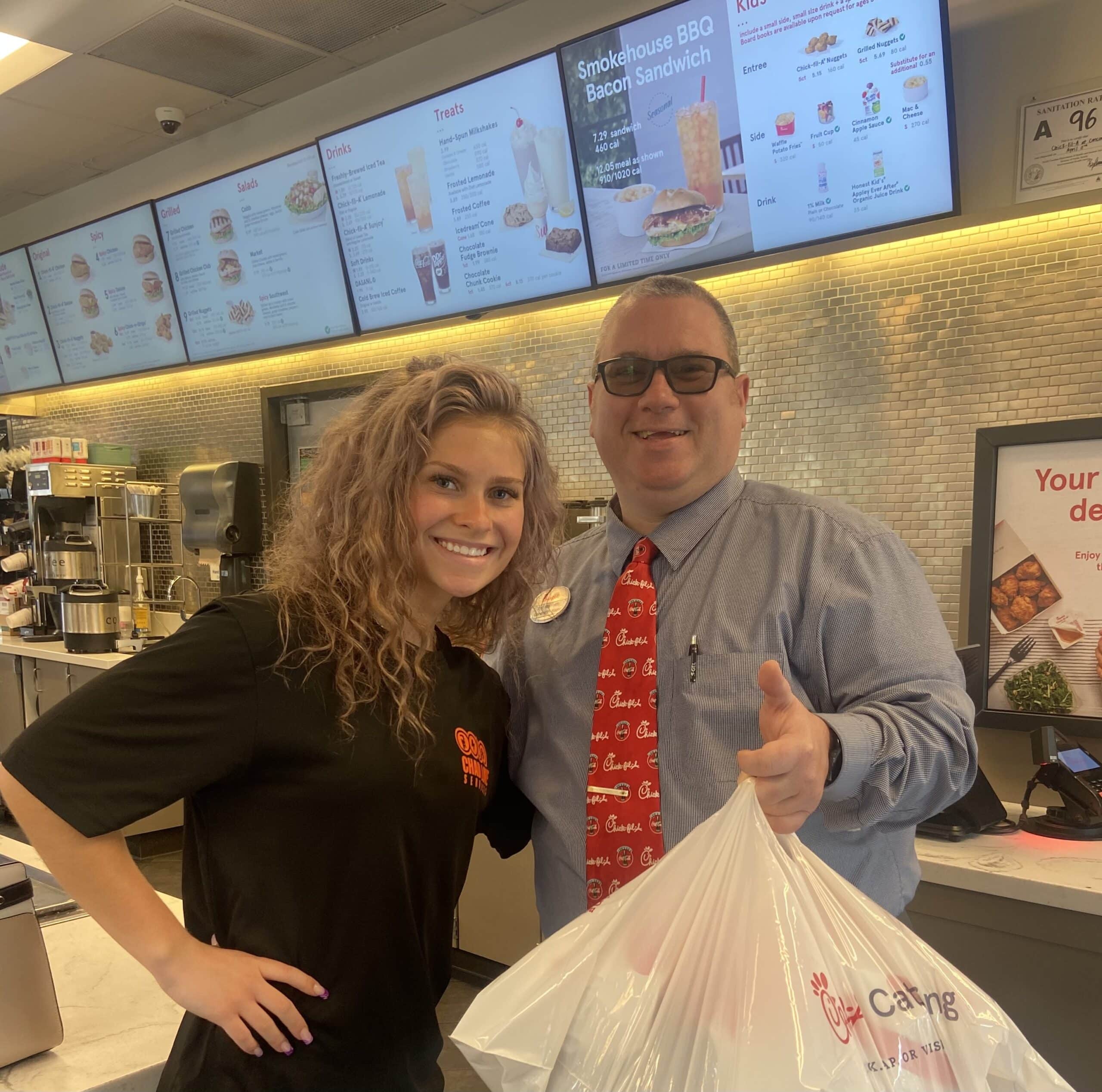 A team member with the local Chick-fil-A manager