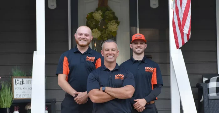 Chad Love Services techs outside of residential home in Concord, NC.